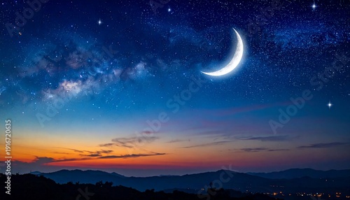 Nighttime Serenity - Crescent Moon Illuminates Starry Sky Above Mountain Range.