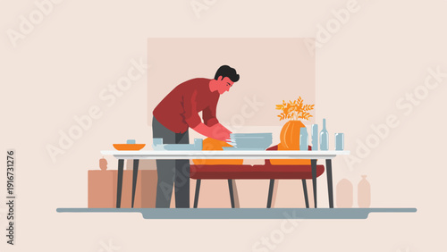 Person washing dishes at a table with decorative items