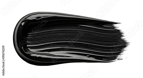 Glossy black paint or mascara swatch with liquid texture