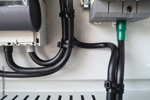 Keep the wiring in the control panel tidy with cable ties.