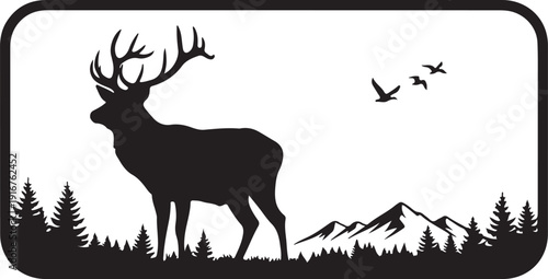 Deer stag with large antlers standing in forest landscape with mountains in background