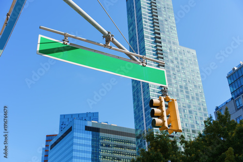 Yellow Traffic Light And Blank Street Sign In New York