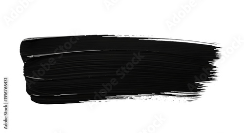 Horizontal thick black paint brush stroke with textured bristle edges