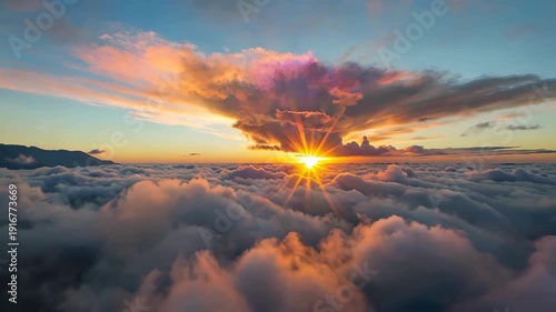 Sunrise scene over sea of clouds