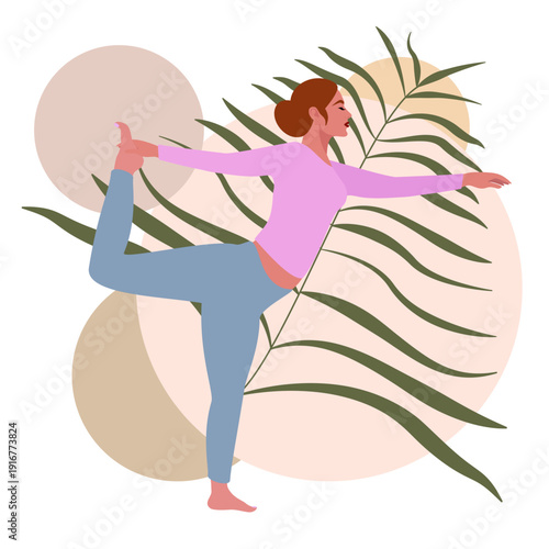 Beautiful white girl with red hair practices yoga in the dance king pose (Natarajasana) against the background of leaves.