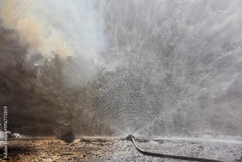 Wallpaper Mural A water diffuser is a firefighting device that shoots water into the air to rain down on a fire Torontodigital.ca