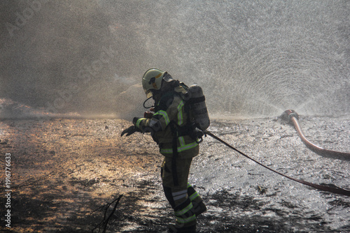 Wallpaper Mural Fire fighting and extinguishing operations with diffuser and water hose Torontodigital.ca