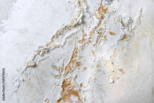 Blistered wall paint caused by trapped moisture and poor ventilation