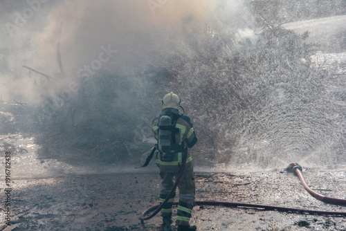 Wallpaper Mural Fire fighting and extinguishing operations with diffuser and water hose Torontodigital.ca
