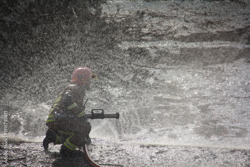 Wallpaper Mural Fire fighting and extinguishing operations with diffuser and water hose Torontodigital.ca