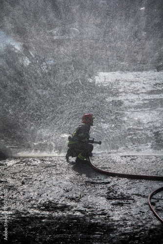 Wallpaper Mural Fire fighting and extinguishing operations with diffuser and water hose Torontodigital.ca