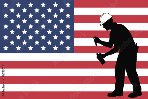 Black silhouette of a construction worker wearing a hard hat over the American flag for Labor Day patriotic industry and United States workforce concepts.