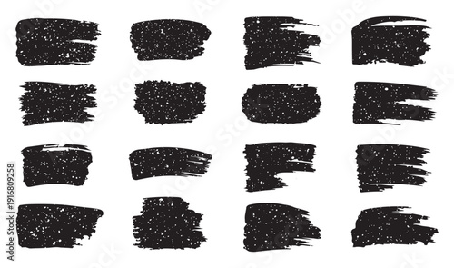 Abstract black brushstrokes on a stark white background creating texture