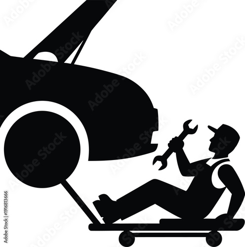 Silhouette Mechanic Working On Car Tire Change Under Vehicle