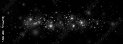 Fantasy stardust and luminous particles with shimmering overlays. Christmas lights, silver accents, and sparkling confetti in a bright celebration.