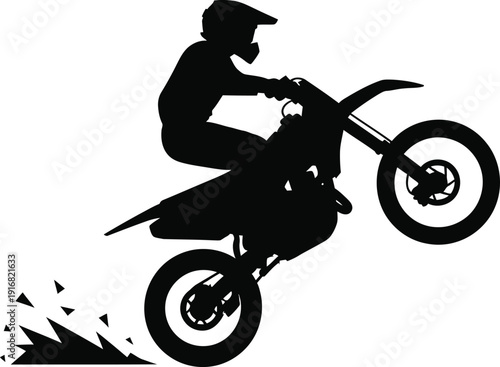 Silhouette Motocross Rider Performing Mid Air Jump On Dirt Bike