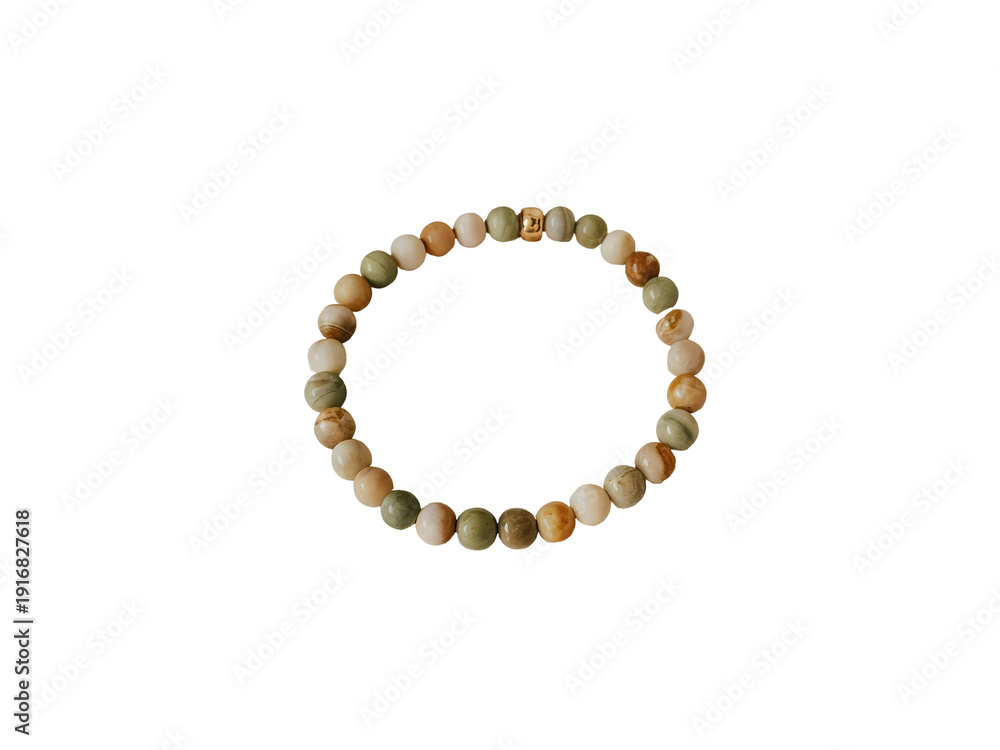 Fototapeta premium Beaded Bracelet with Earthy Tones and Gold Accent Isolated on Black Background