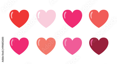 Collection of eight glossy hearts in various shades of red and pink on a white background. Vector illustration
