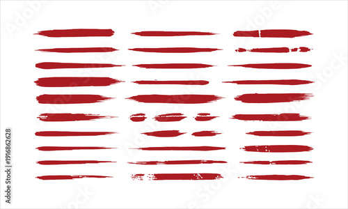 Red brush strokes and paint splatters isolated on white background