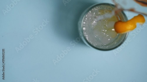 Serving of fizzy lemonade juice in a glass