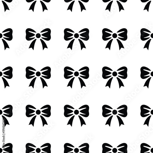 A repeating pattern of black bows on a clean white background