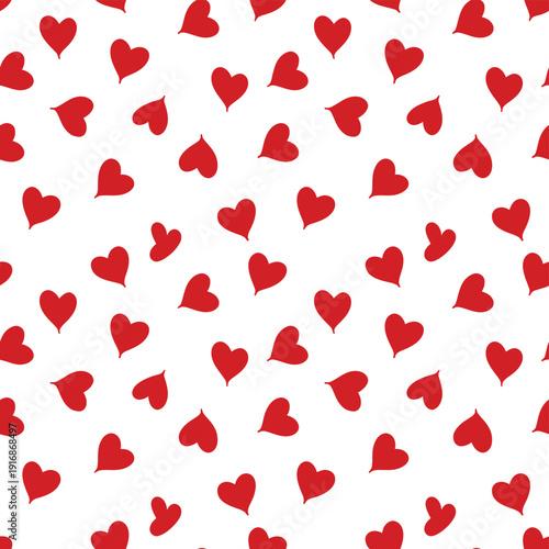 A seamless pattern of vibrant red hearts scattered on a white background