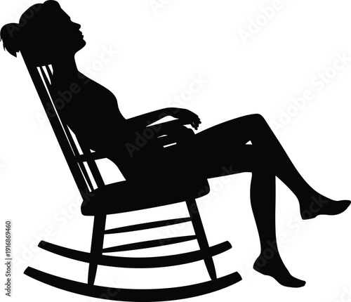 Silhouette of a person sitting on a rocking chair with legs crossed
