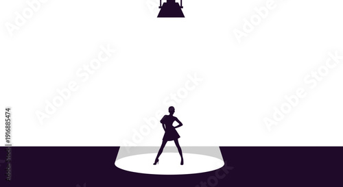 Silhouette of a dancer in a spotlight on stage