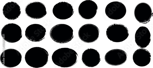 A grid of twenty oval shaped black blobs on a white background with no discernible pattern or symmetry