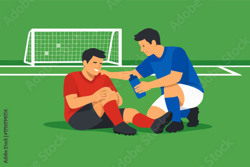 Football player assisting an injured teammate with water on the green field