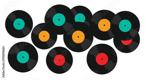 Assortment of retro black vinyl records with colorful center labels scattered across a white surface.