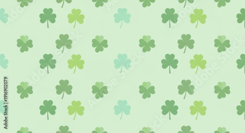 Seamless pattern of green shamrock clover leaves on pale mint background with soft watercolor texture and subtle paper grain, repeating Irish St. Patrick’s Day motif
