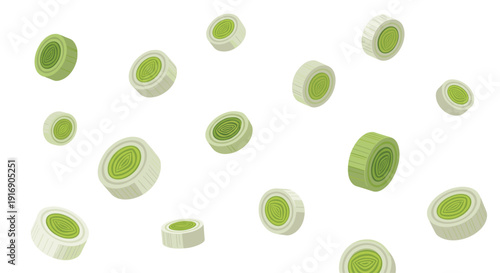 Numerous green and white sliced leek or onion rings are scattered and falling across a white background.