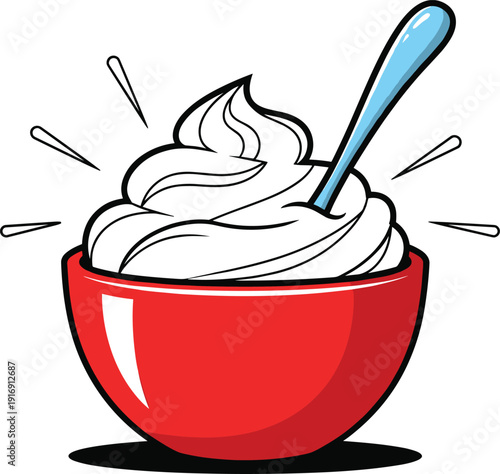 Bowl of fresh whipped cream with swirls and spoon