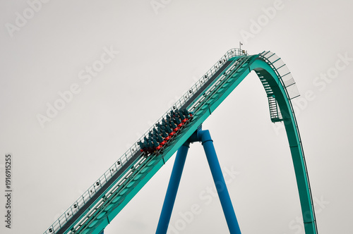 Roller coaster ride going up on the track