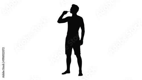 Silhouette of a man smoking a pipe standing in a relaxed pose