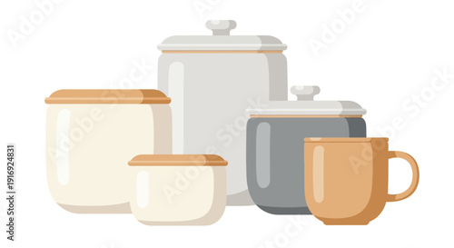 A collection of ceramic kitchen canisters and a matching mug