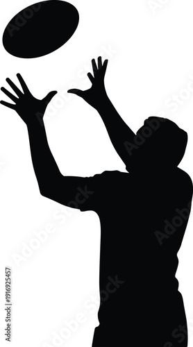 Man playing frisbee in dynamic motion with raised hands