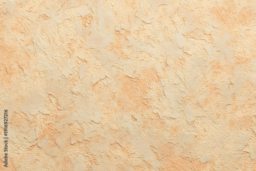 Fototapeta premium Textured Cream-Colored Wall with Orange Tints 