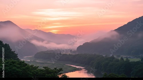 Serene Mountain Valley Sunrise with Mist and River.