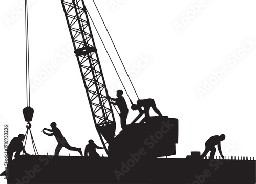 Silhouette of construction workers and crane lifting heavy