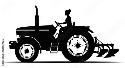 Farmer operating heavy tractor with plow attachment for agricultural work