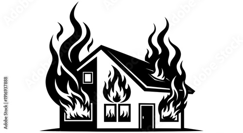 House engulfed in large flames with fire burning on the roof and walls intensely