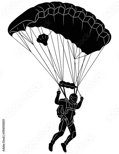 Skydiver in mid-air with parachute open descending towards the ground safely