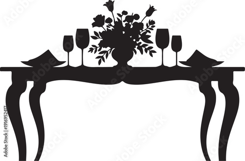 Black and white silhouette of a dining table with wine glasses and flowers