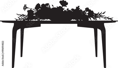Black silhouette of a table with floral arrangement and two chairs
