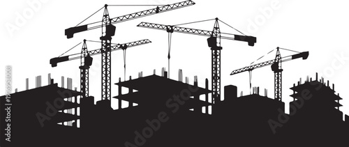 Silhouette of construction cranes and buildings under construction