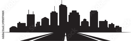 Black silhouette of city skyline with train tracks in foreground