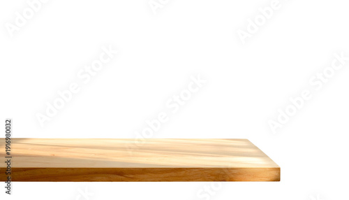 A close-up of a wooden surface, edge in focus, against a solid black background