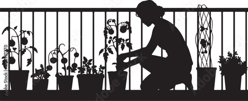 Silhouette of person gardening with potted plants on balcony